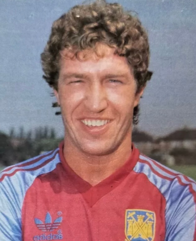 Patsy Holland’s time at Upton Park was a real mix of highs and lows, from FAC & Div II winner to ECWC runner up, relegation and missing the 1980 FAC Final through injury. The right sided midfielder suffered a career ending knee injury scoring against Notts County in Jan 1981.