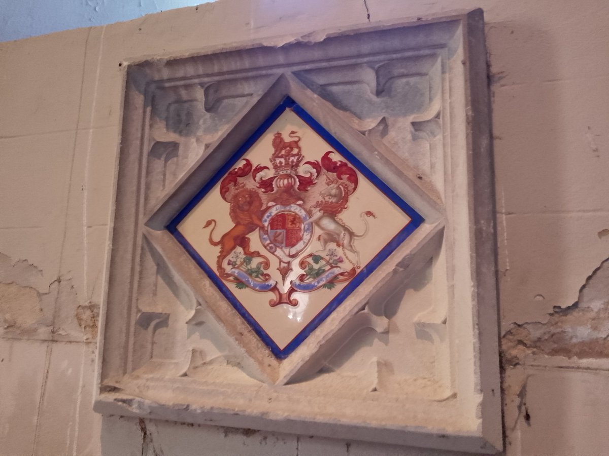 Victorian Tile of Royal Arms set in the Western end in the Tower of #StMichaelAndAllAngelsFarndish #TilesOnTuesday 
 #PhilOnaBike