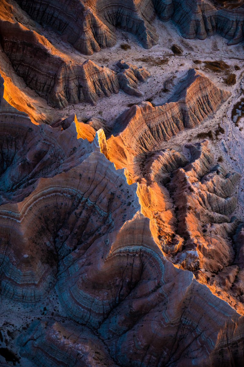 This overhead shot of Badlands National Park was captured by the talented (IG: scottosbornphoto) using his Nikon Z 6II + NIKKOR Z 24-70mm f/2.8 S 🧗