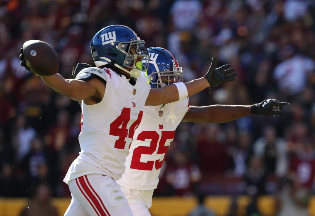 Thrilling game alert! Darius Slayton celebrates a TD with Isaiah Hodgins as the Giants face off against the Commanders. Full energy at FedExField!  #NYGiants #NFL2023
