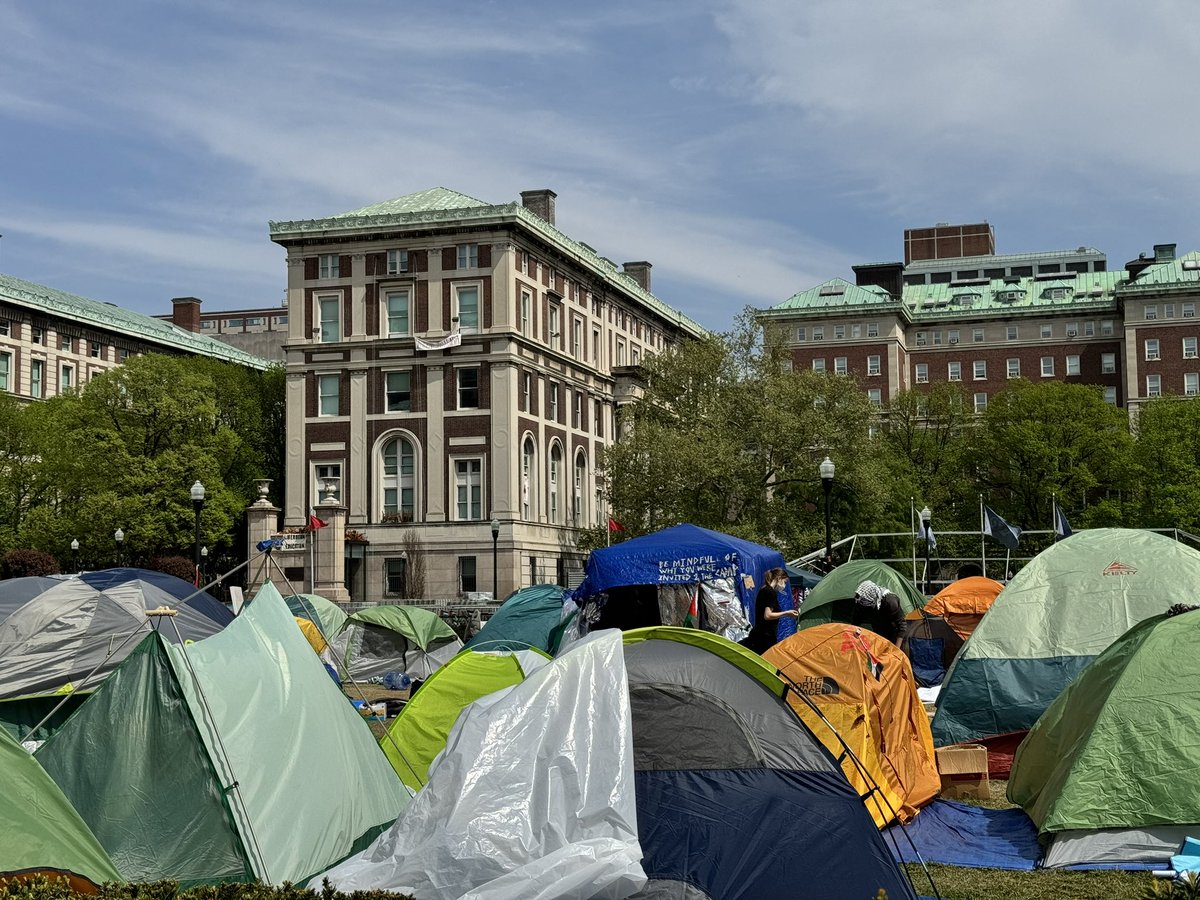 You can hear the demonstrators outside of the campus gates, but here, inside, the encampment and the occupied Hamilton Hall (center-left) are very calm at the moment. @Columbia @columbiajourn