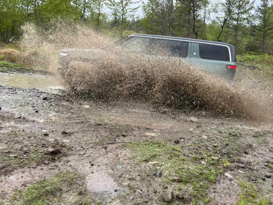 comradeflynn's tweet image. Took my one week old Rivian R1S off-roading and was blown away by how capable it was, even on the road tires.
