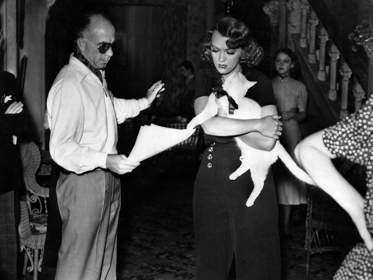 Director Gregory La Cava with Eve Arden on set of STAGE DOOR (1937)