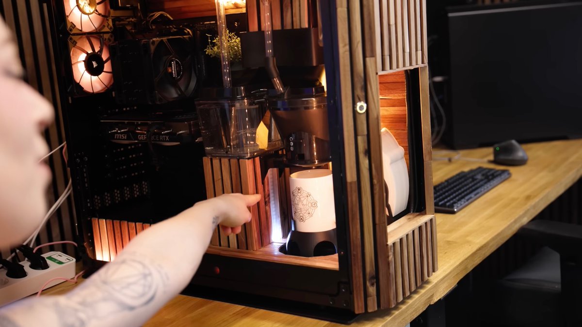 .@TheNerdforge's Martina and Hansi created a custom PC that comes complete with a roaster and grinder inside for making freshly brewed coffee right at their desk: youtu.be/oSVPkuplVRY