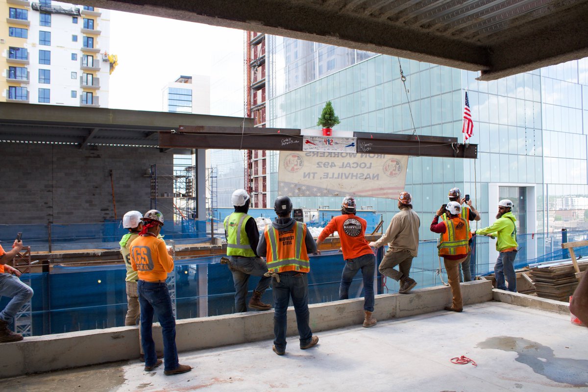 The @nashvilleyards, #CreativeArtistsAgency @caa_sports, @ClarkBuilds, & @BellConstCo teams celebrated the #ToppingOut of the Class A+ Creative Office Building! Learn about the 420K sq.ft. building developed by #SWVP & @aegworldwide & anchored by #CAA: nashvilleyards.com/news