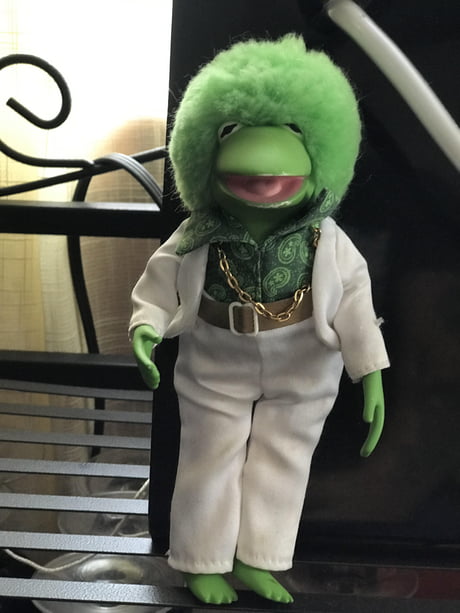 Kermit doesn't think of outfits in parts or as a pseudo-science (e.g., black goes with blue), but as cultural language. He thinks of the *total* outfit and what it conveys. The rebel look with a biker jacket and jeans. Or the time he wore white suits with gold chains in the '70s