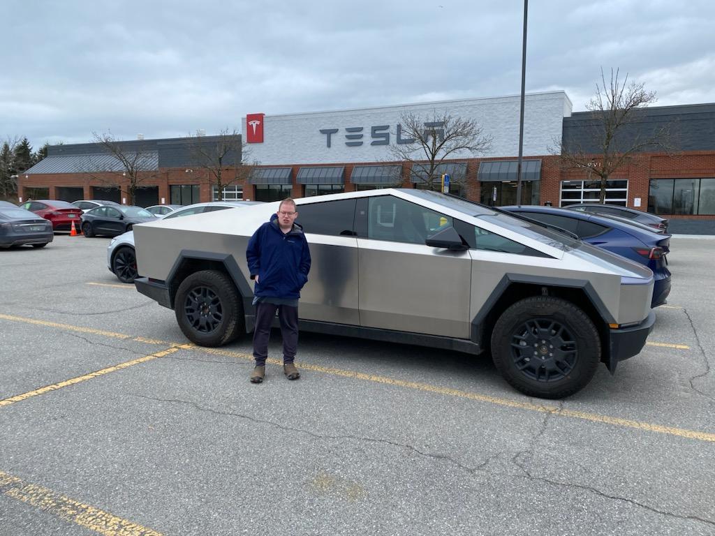 me near a cybertruck at the new telsa dealer