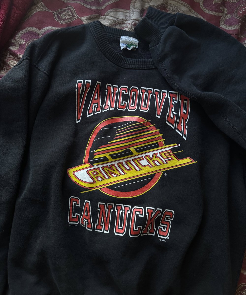 thrifting this beautiful canucks crewneck is one of my greatest accomplishments