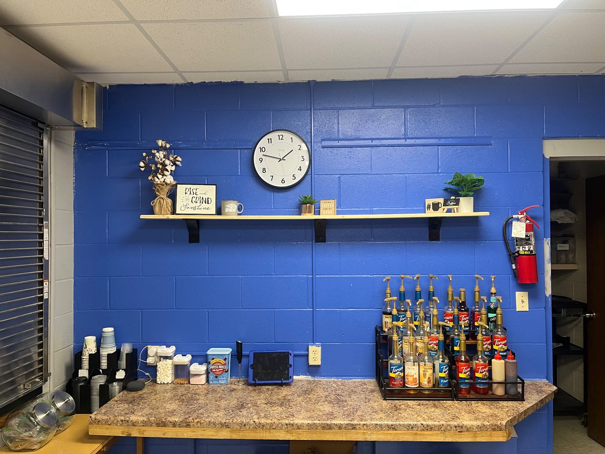 Ron Knudsen created this AMAZING shelf for our Daily Grind Coffee shop at the high school! #rollblue 💙☕️