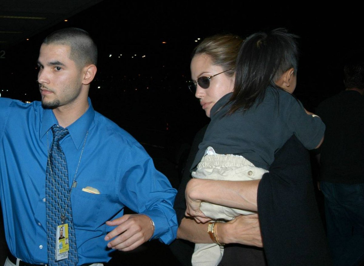 #AngelinaJolie Date: May 31, 2004 | Location: Los Angeles, USA Angelina and Maddox arrive at LAX airport