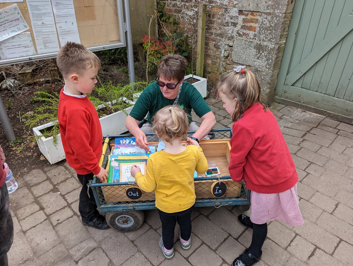 Our lending library supports ethos from Realising the Ambition (2019) explaining, 'We should tap into what we know about the child’s interests.. to attach talking, listening, reading and writing to meaningful environments and experiences created within settings.' #redjacketpeople