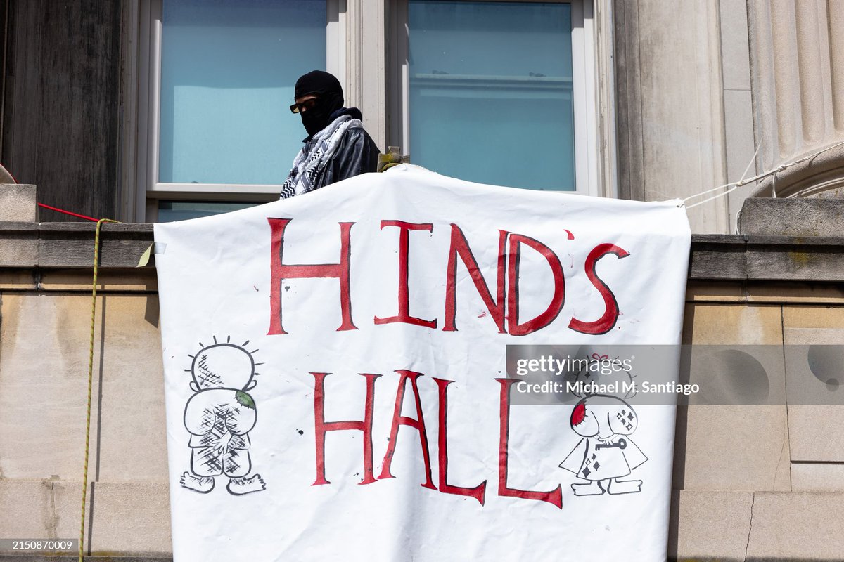 Pro-Palestinian protestors occupy Hamilton Hall at Columbia University after seizing it overnight. They unfurled a banner honoring Hind Rajab, a child who died with other family members while fleeing Gaza City in January 2024 📸: @msantiagophotos