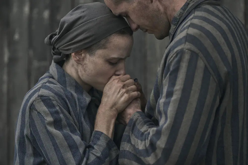 A love story in the middle of hell on Earth. #TheTattooistOfAuschwitz streams on Peacock beginning May 2. See what we thought of it HERE: bit.ly/49U1eE0