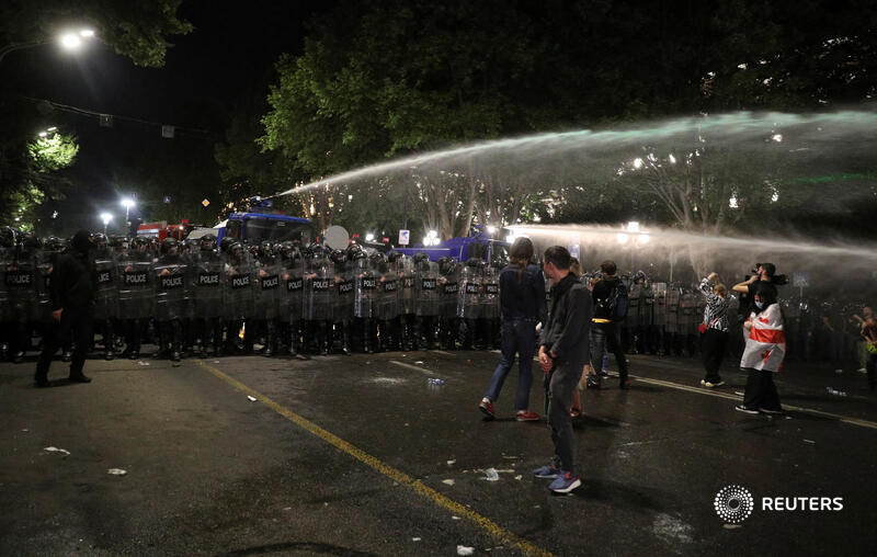 Georgian security forces used water cannon, tear gas and stun grenades against protesters, escalating a crackdown after lawmakers debated a 'foreign agents' bill which is viewed by the opposition and Western nations as authoritarian and Russian-inspired reut.rs/3WlPp6s