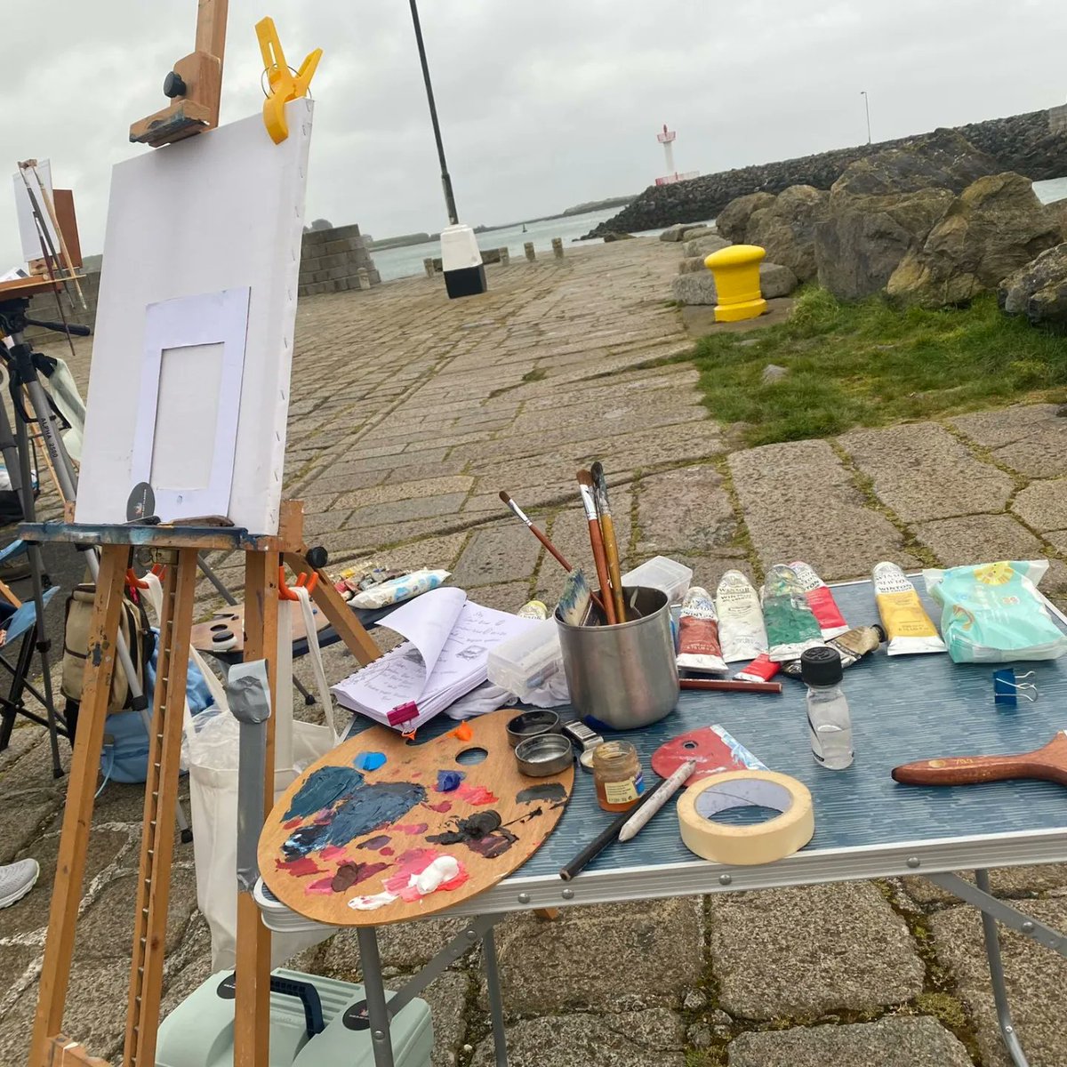 One of our artists getting set up for some en plein air painting at Howth Pier. #howth #painting #enpleinair #oilpainting