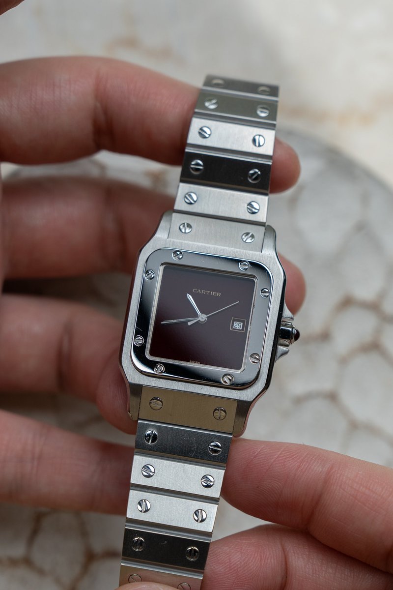 The Cartier Santos Carree 2960 with the rare burgundy dial