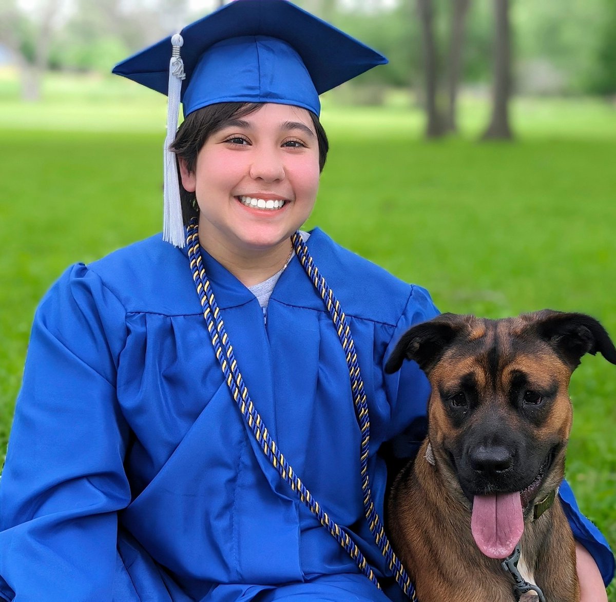 Took a few Senior Shots today of my baby. She'll be graduating w/her Associates and HS Diploma simultaneously, & I couldn't be more proud of her. Here she is with her best girl, Zelda. (Don't ask how many tries it took...🤦🏽‍♀️🙄)
#graduation 
#seniors2024 
#proudmom