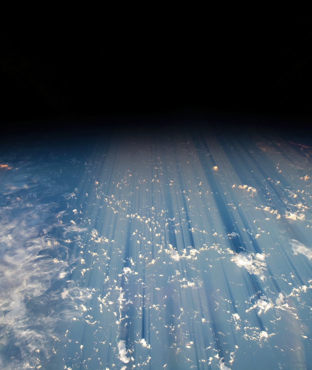 Shadows of clouds thousands of kilometers long over the Pacific Ocean View from the ISS.🌊