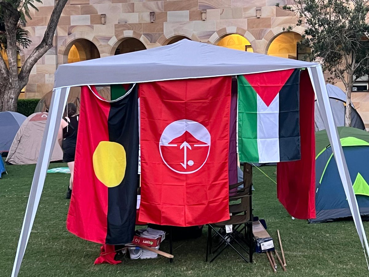 Terrorist flag at Australian university protest. The flag of a notorious terrorist organisation, the PFLP was spotted at an antisemitic rally at the University of Queensland. The PFLP is responsible for many murders and attacks. This is a national security concern.