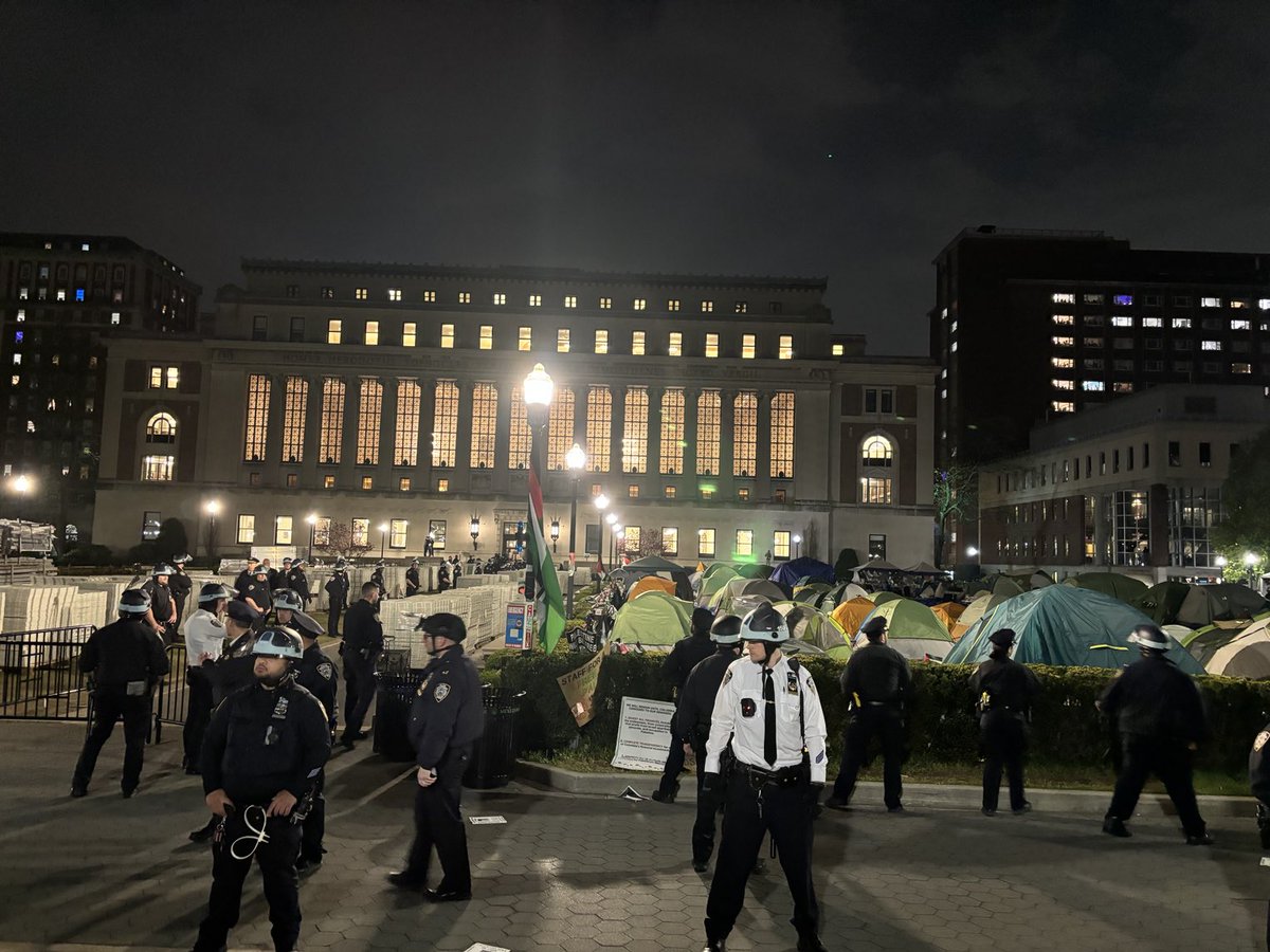 Police are surrounding the encampment.