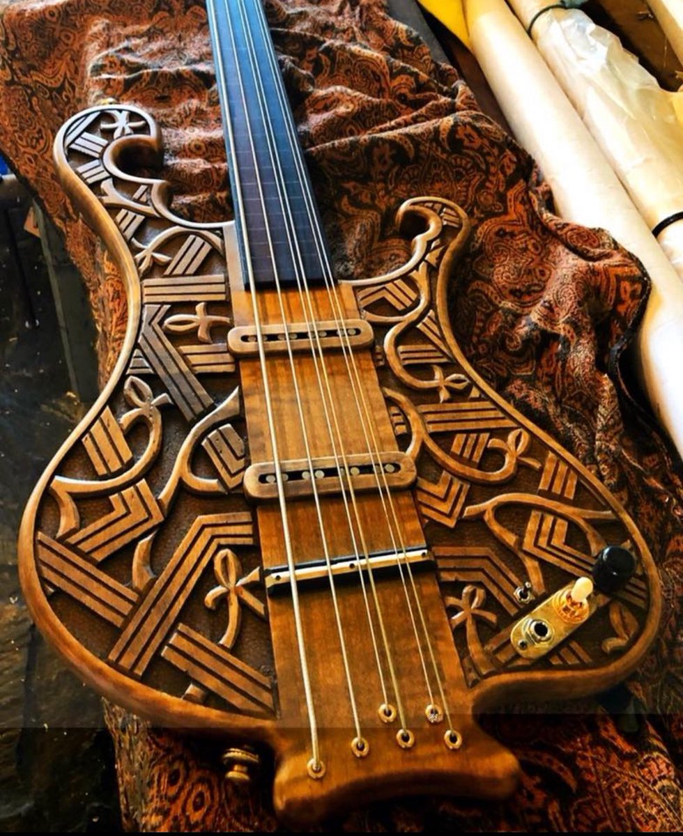 A Matais Crom fretless bass with double strings on the D and G