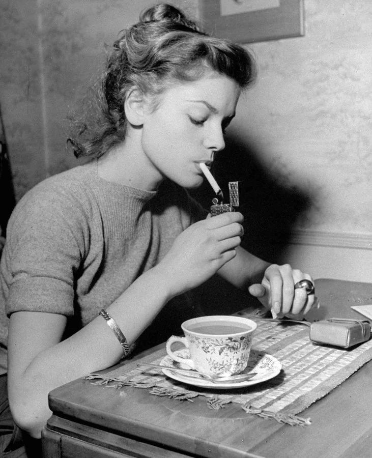 Lauren Bacall having breakfast (1946)