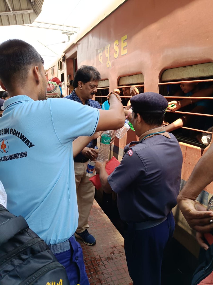 Scouts and Guides providing cold and clean drinking water to passengers.

In pic: TATANAGAR Station