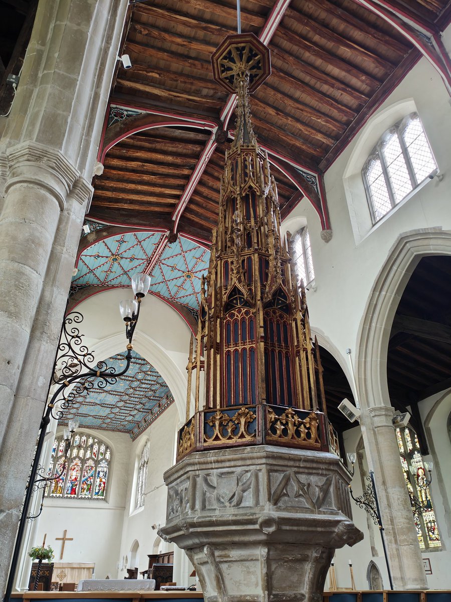 The remarkable 15th century font cover in St Gregory's Church, Sudbury, Suffolk. Still in its original red and gold paint it measures about twelve feet tall and was described by Pevsner as one of the finest in the country. In the 1800's it was adapted to telescope upwards.