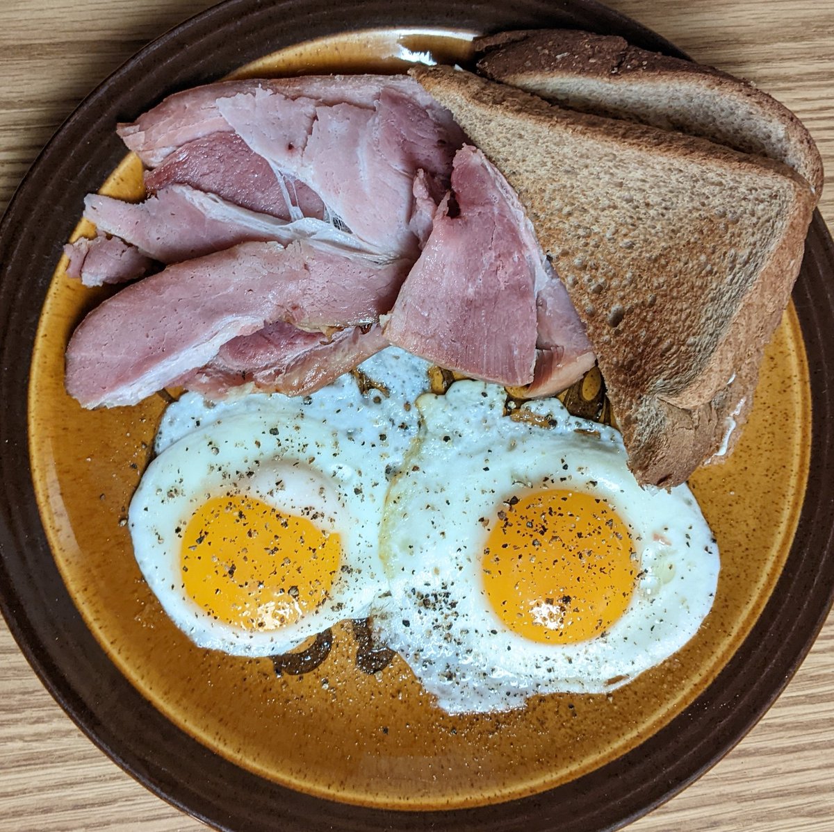 Two Eggs - Sunny-Side Up, Baked Ham and Wheat Toast 

#allkindsofrecipes #testkitchen #twoeggssunnysideup #twoeggs #friedeggs #sunnysideup #sunnysideupeggs #ham #hamandeggs #hameggsandtoast #toast #wheattoast #breakfast