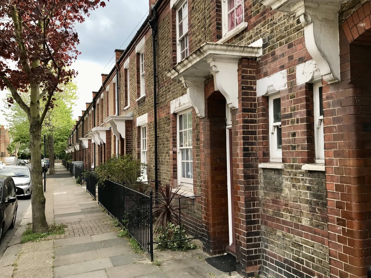 Social housing from 1903: the lovely Latchmere Estate, Battersea. terraces of 315 homes with bathrooms, kitchen ranges and dignity around 3 acres of park. By respecting ancient forms of urban design not upending them, it is so much better than what was to follow.
