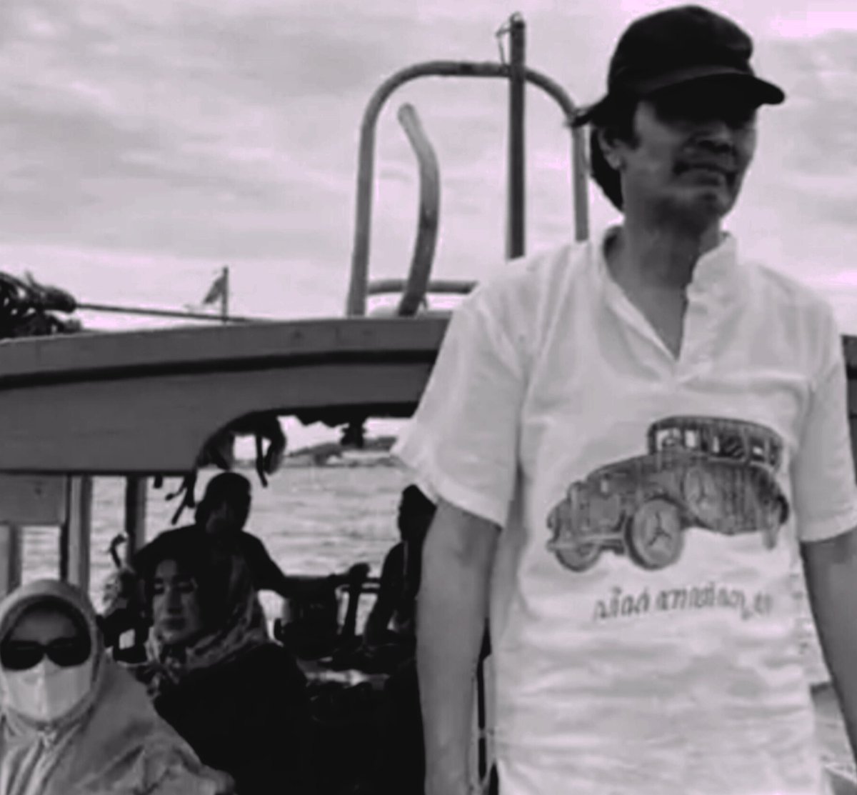 Post a selfie from your gallery but make it black and white