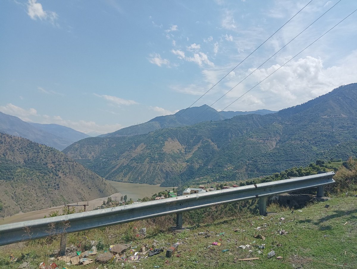 Following this winding road, not sure where it leads, but excited to find out. 🛣️  #adventureseeker #openroad #theunknown'