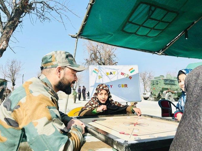 #IndianArmy share playful moments with Kashmiri children over a game of carrom. Moments like these inspire hope and unity.