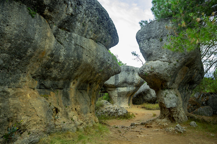 The Ciudad Encantada (Enchanted City) began forming 90 million years ago, when the Tethys Sea receded, eroding the limestone rock to create these shapes. Only 17 miles outside the city of #Cuenca, will you visit this natural wonder? 👉 bit.ly/49YsTV9 #VisitSpain