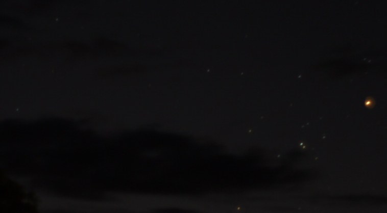 Far from my best .. new unfamiliar camera ($40 Panasonic G10), clouds, bad focus, dog ate my cleaning cloth. Red Aldebaran far left and Comet 12p/Pons-Brooks far right centre shot. May 1 2024