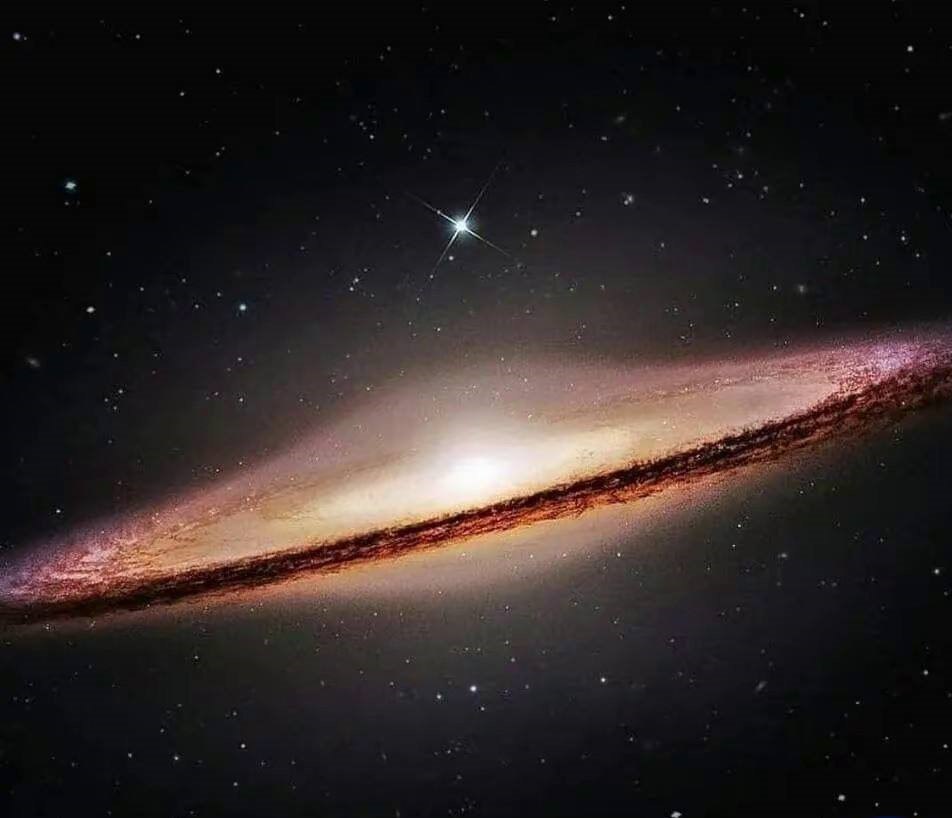 M 104 (NGC 4594) is a spiral galaxy in the constellation Virgo at a distance of 29.3 (± 1.6) million light—years from Earth The diameter is about 50,000 light—years (approx. 15 thousand pcs) — about 30% of the diameter of the Milky Way.