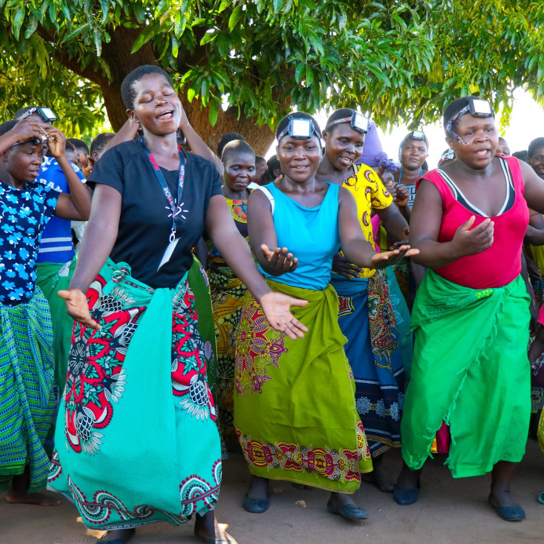 Our in-country partners sing, dance, distribute lights, teach financial literacy, drive us to villages, teach the global travel team about the culture, and so much more!