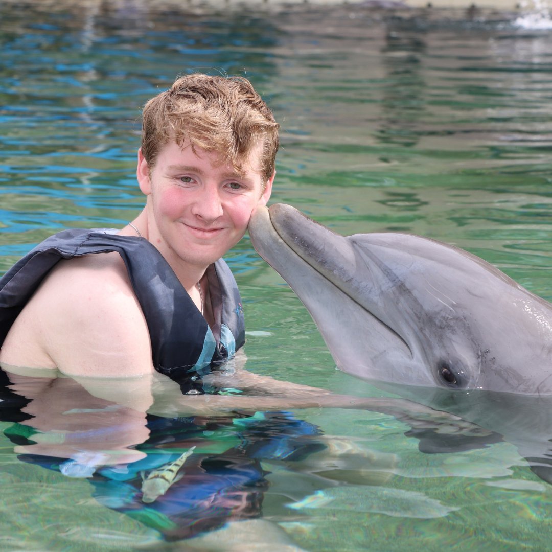 Despite having a heart condition diagnosed in infancy & undergoing multiple surgeries, Connor tackles life's challenges with grace. His dream of swimming with dolphins recently came true, bringing boundless joy to him & his family while providing a break from routine treatments🐬