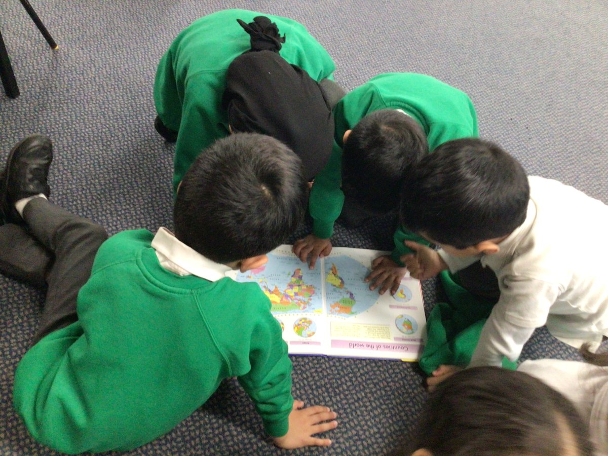 Year 1 loved exploring the atlases today, finding out about using the contents page, index and using keys to identify features on maps.