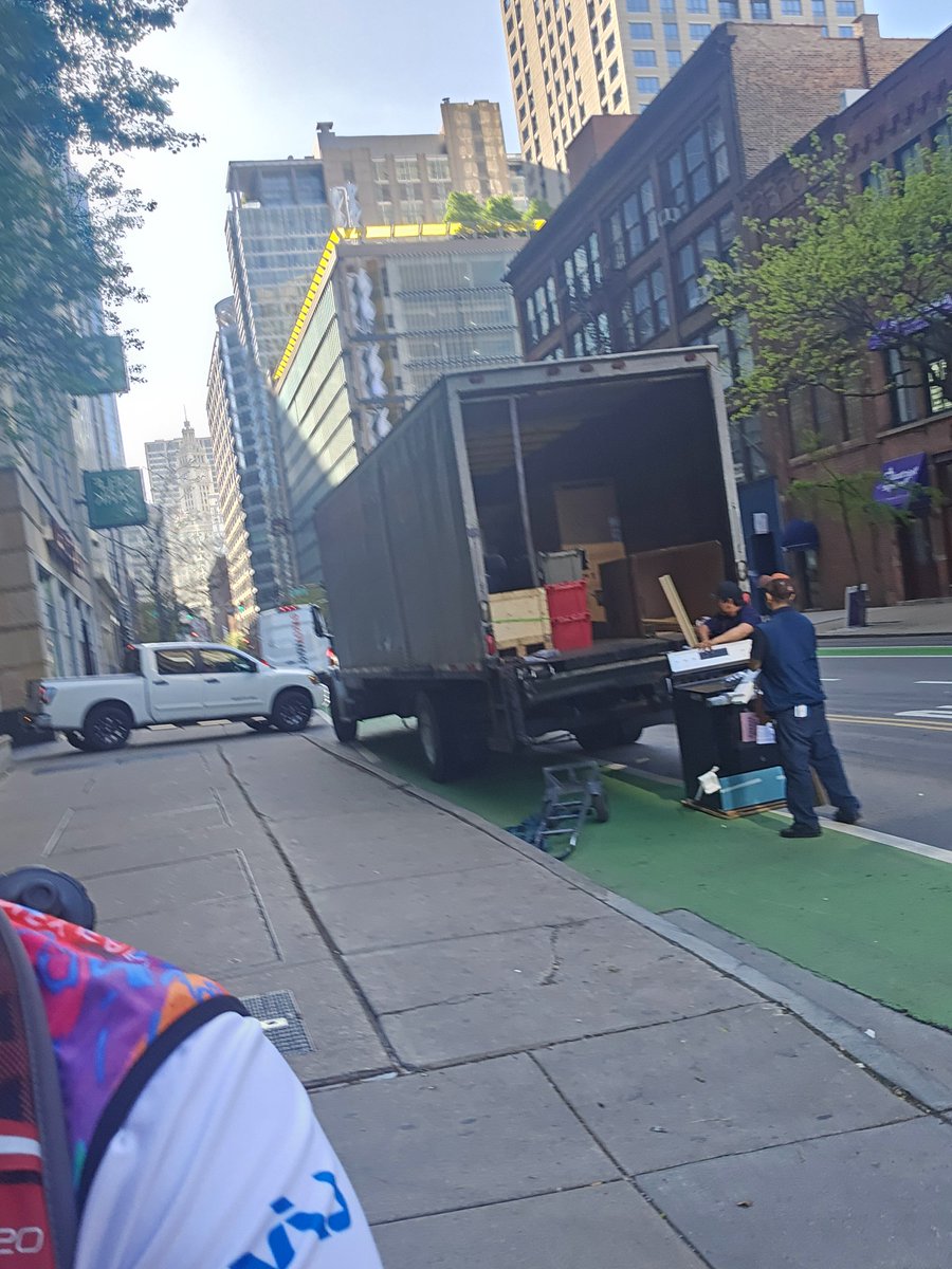 Oh look, a truck parked in the Kinzie Bike Lane. In front of a building with a turnaround and a loading dock. What a shock. @bikelane