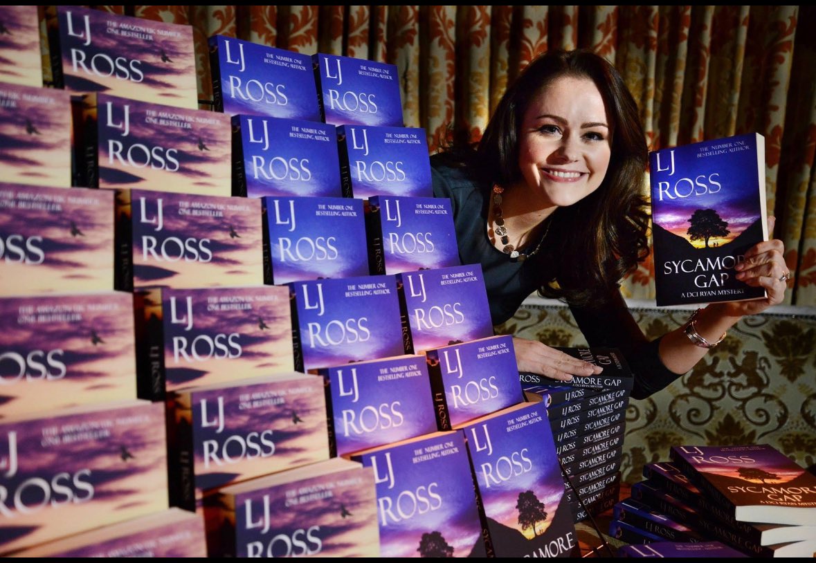 Here’s a bit of nostalgia! This picture was taken in 2015, after the release of my second book, Sycamore Gap. The books you see are the original Amazon-printed KDP editions, which I was (and still am) very proud of. We carried the stand ourselves, put them all out, I signed…