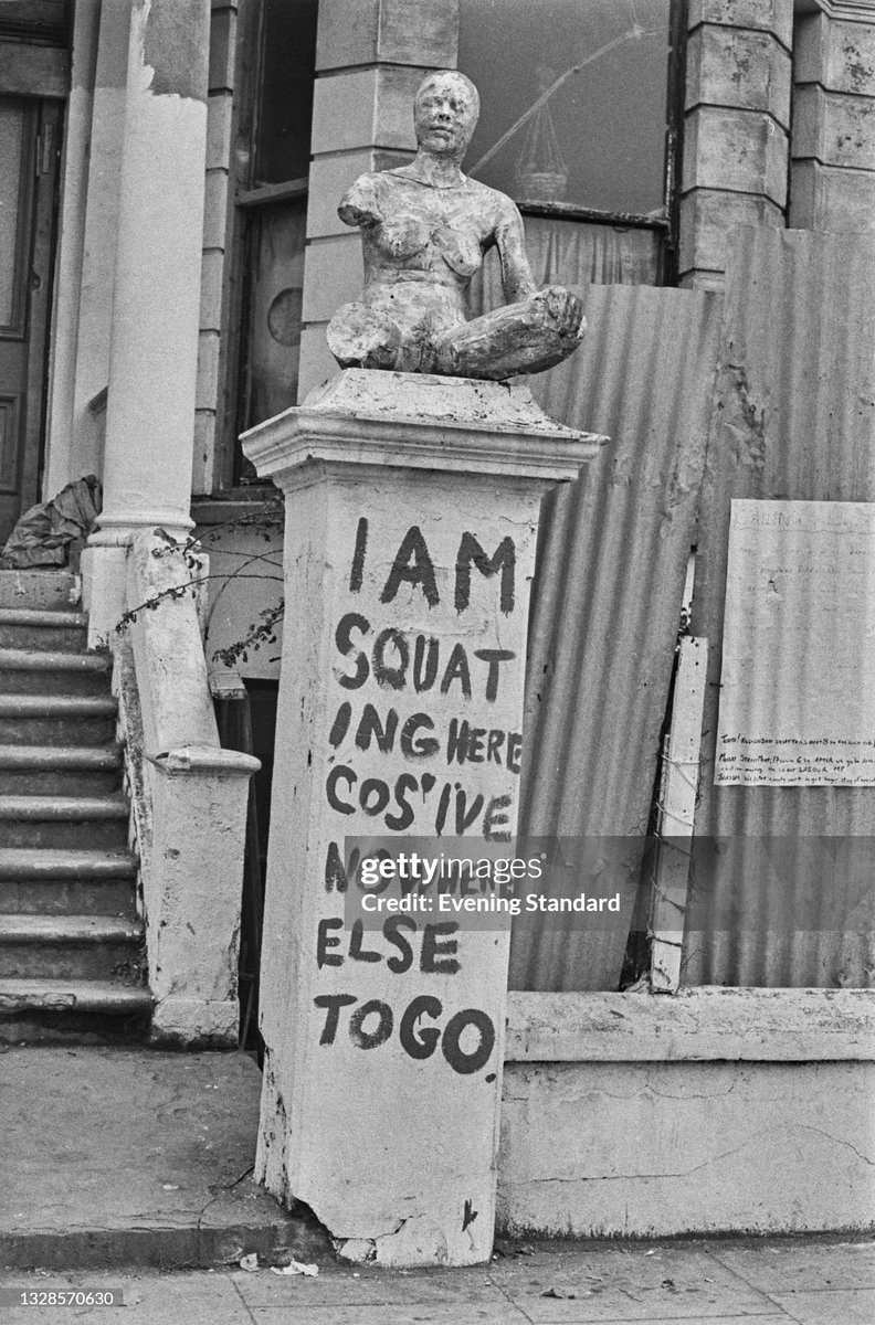 Graffiti outside an empty house occupied by 'squatters' at 19 Elgin Avenue, Paddington, London, UK. It reads 'I am squating (sic) here cos' I've nowhere else to go' (1974)