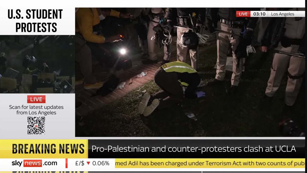 A woman kneeling in prayer in front of a line of state troopers called in to break up pro-Palestinian protests at UCLA. Some incredible images in @marthakelner's live reporting from the clashes on Sky now