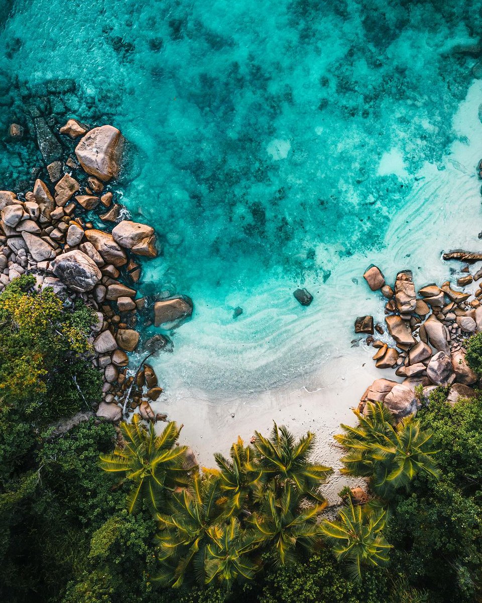 Paradise found! Seychelles' stunning beaches are a tropical dream come true. Soft white sand, crystal-clear waters, and swaying palm trees create a serene oasis. Escape to this island haven and bask in the sun, snorkel in the turquoise sea, or simply relax in a beachside paradise