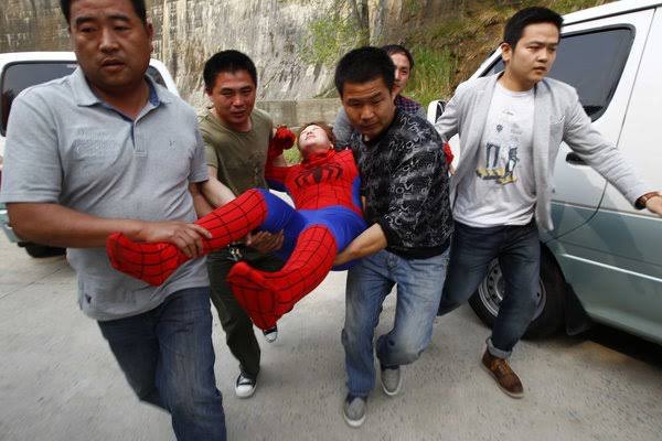 Spiderman being arrested by CMI operatives after trying to rescue a NUP supporter they had kidnapped 😂