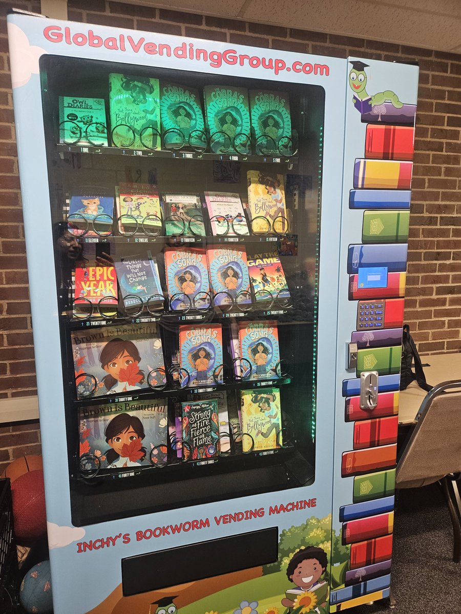 It has been 2 days but I'm still not over this - It is Collins Elementary School's book vending machine! And my books and friends' books are in it! Thank you @CollinsSchool54 and the Our School, Our Author team for this awesome sight.