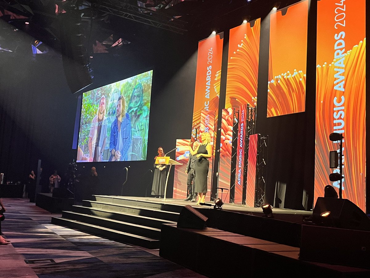 APRAAMCOS's tweet photo. “It’s an absolute blast to honour these guys,” said @JimmyBarnes as he unveils Sam and Josh Teskey as Songwriter of the Year. #APRAs https://t.co/3W9GXqbllW