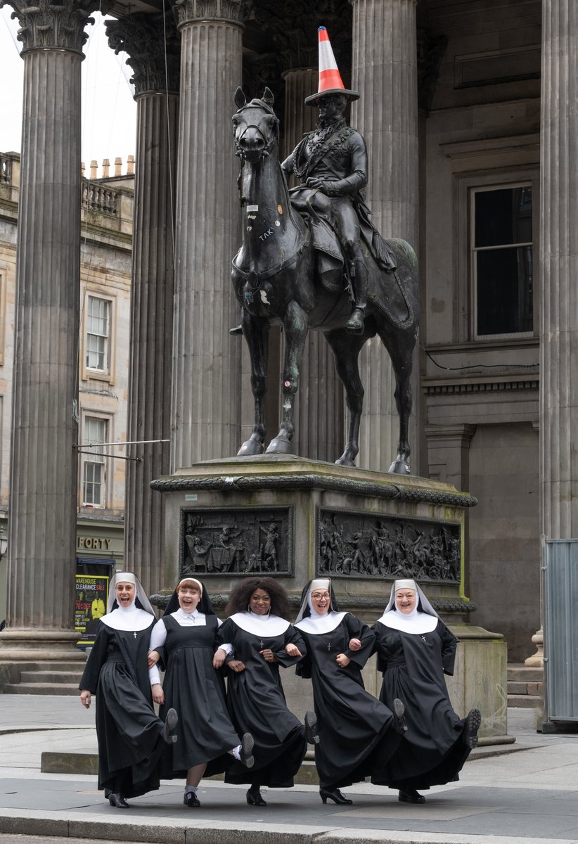 What a 'Nun'-derful World 🙏 The cast of Sister Act have landed in Glasgow and they visited the Merchant City to strike a pose with the city's most famous traffic cone! 📆 See them in action until Saturday 🎟️ atgtix.co/3GgShZg 📷 Julie Howden