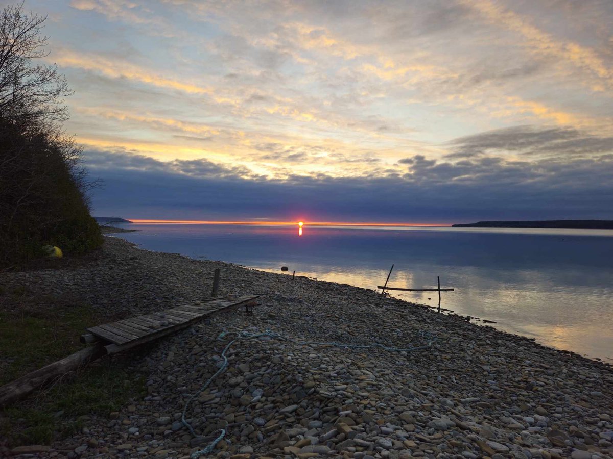 Good morning. The water looks so calm. We are beginning the preparations for continuing our journey on the Bruce Trail next Tuesday. Thanks Andrew for the lovely view from earlier this morning. #sunrise #goodmorning #Wednesday #April #BruceTrail #georgianbay #hiking