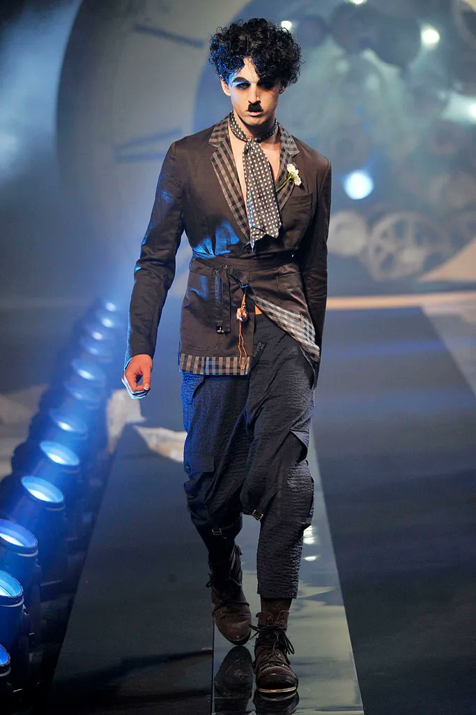 Captivated by Galliano's emo, Chaplin-inspired menswear collection for S/S 11